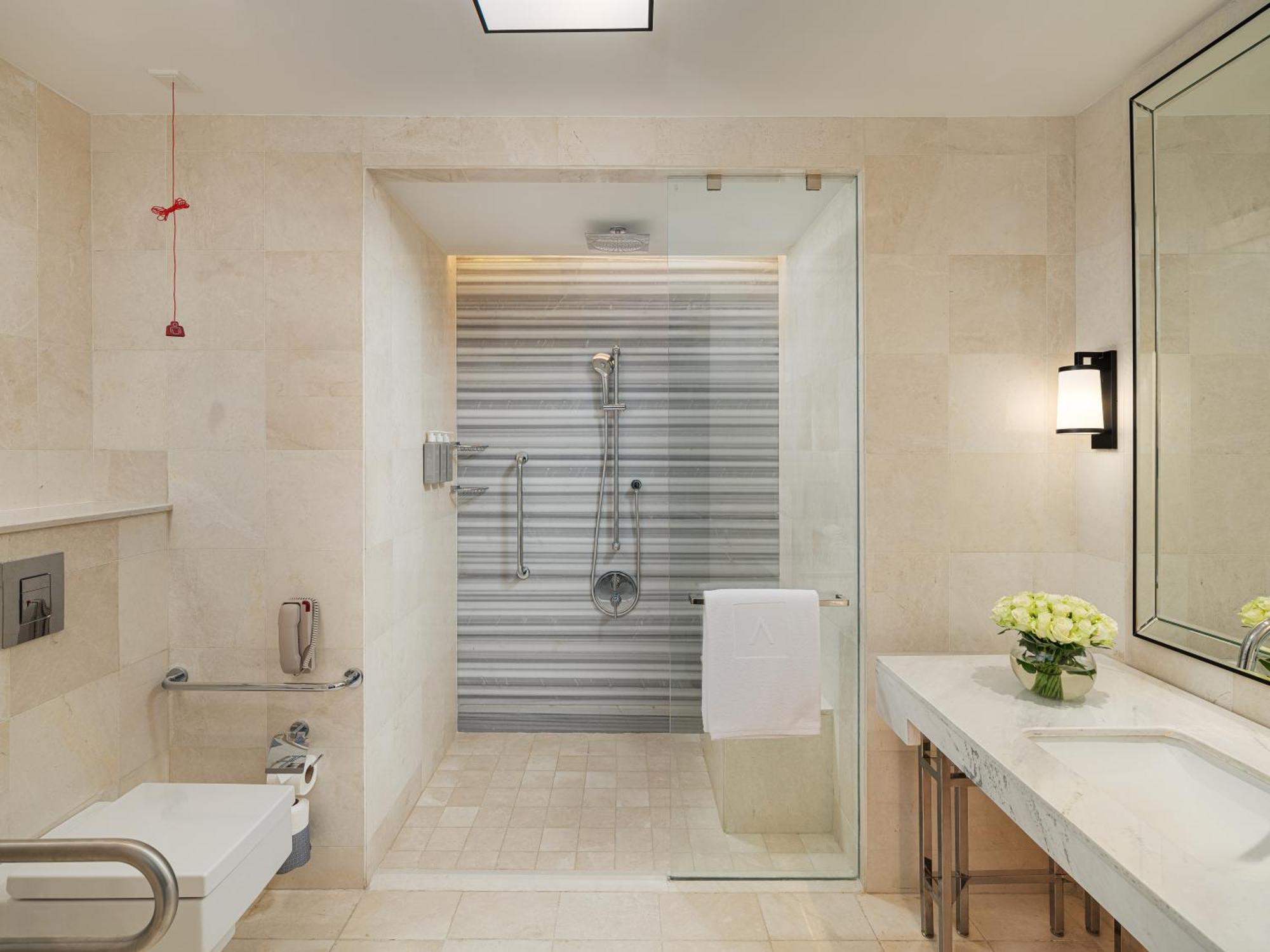 Address Jabal Omar Makkah Aparthotel Mecca Exterior photo A shower with a sliding door